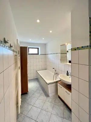 Ein Badezimmer in der Unterkunft Ferienwohnung am Rathaus