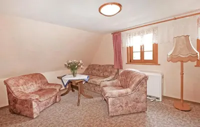 Ein Sitzbereich in der Unterkunft Ferienwohnung Neuhausen
