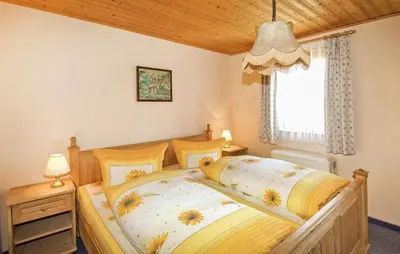 Ein Bett oder Betten in einem Zimmer der Unterkunft Ferienwohnung Neuhausen