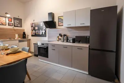 Küche/Küchenzeile in der Unterkunft T21 - Apartment direkt im Zentrum mit Parkplatz