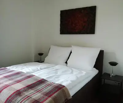 Ein Bett oder Betten in einem Zimmer der Unterkunft Mittelalterliches Domherrenhaus