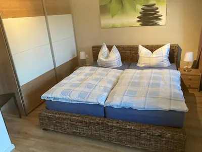 Ein Bett oder Betten in einem Zimmer der Unterkunft Landhaus Böhmer, Ferienwohnung Papststein