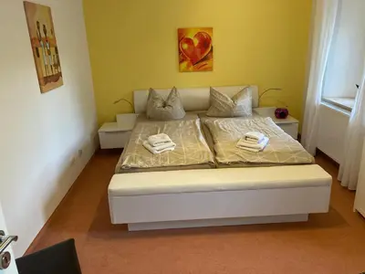 Ein Bett oder Betten in einem Zimmer der Unterkunft Landhaus Böhmer, Ferienwohnung Papststein