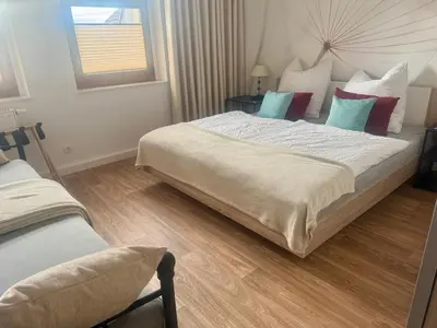 Ein Bett oder Betten in einem Zimmer der Unterkunft Apartment im Elbtal Dresden, Meißen, Moritzburg