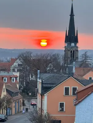Blick auf den Sonnenuntergang/Sonnenaufgang von der Ferienwohnung aus oder aus der Nähe