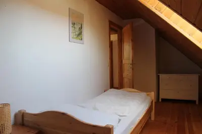 Ein Bett oder Betten in einem Zimmer der Unterkunft Zu Gast bei den Zaungästen