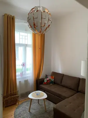 Ein Sitzbereich in der Unterkunft Ferienwohnung am Tivoli