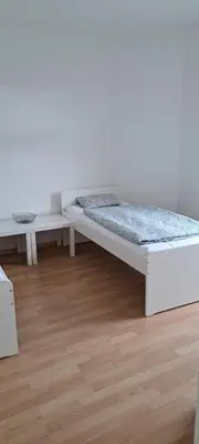 Ein Bett oder Betten in einem Zimmer der Unterkunft Moderne Monteurswohnung in Chemnitz