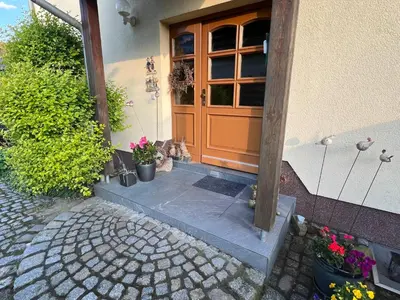 Ein Garten an der Unterkunft Ferienwohnung Am Kiessee Birkwitz