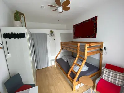 Ein Bett oder Betten in einem Zimmer der Unterkunft Ferienwohnung Tiny-Klotzsche