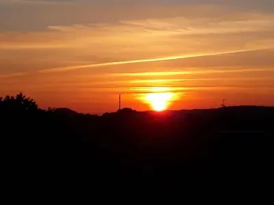 Blick auf den Sonnenuntergang/Sonnenaufgang von des Ferienhauses aus oder aus der Nähe