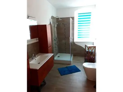 Ein Badezimmer in der Unterkunft II 