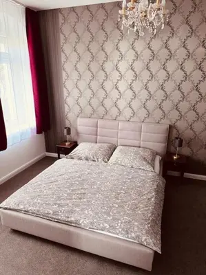 Ein Bett oder Betten in einem Zimmer der Unterkunft Ferienwohnung Cosel