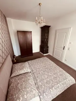 Ein Bett oder Betten in einem Zimmer der Unterkunft Ferienwohnung Cosel