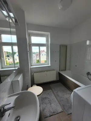 Ein Badezimmer in der Unterkunft Monteurswohnung Roßwein - Zentral - Küche