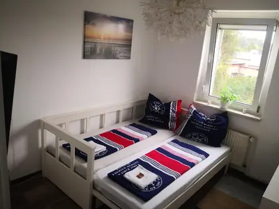 Ein Bett oder Betten in einem Zimmer der Unterkunft Lausitz Lindena See Nähe
