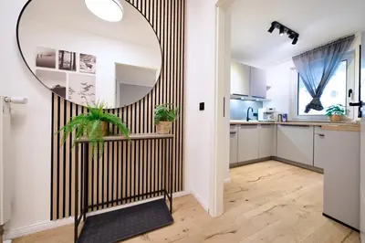 Küche/Küchenzeile in der Unterkunft EDLER WOHNRAUM Elegantes Apartment mit Balkon, Boxspringbett, Kaffeevollautomat, Lift & Parkplatz