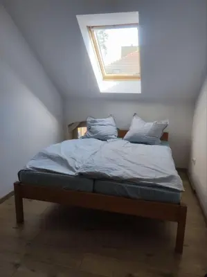 Ein Bett oder Betten in einem Zimmer der Unterkunft Haus am See Annahütte - für bis zu 6 Personen