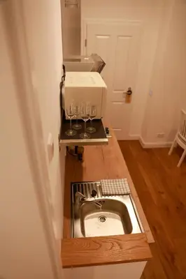 Küche/Küchenzeile in der Unterkunft Boutique Hotel Pension Luisengrün Küche 1Gbs WLAN Netflix Disney MagentaTV
