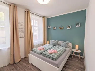Ein Bett oder Betten in einem Zimmer der Unterkunft HW3B- Urlaubsmagie - großes Wohnzimmer & 2 Schlafzimmer