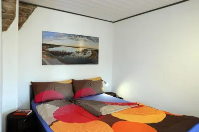 Ein Bett oder Betten in einem Zimmer der Unterkunft SeeNest Lieske