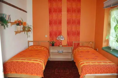 Ein Bett oder Betten in einem Zimmer der Unterkunft Ferienwohnung Sunwood