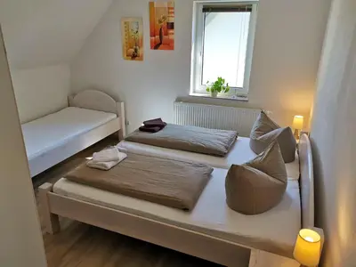 Ein Bett oder Betten in einem Zimmer der Unterkunft Ferienhaus in Papstdorf Sächsische Schweiz 17