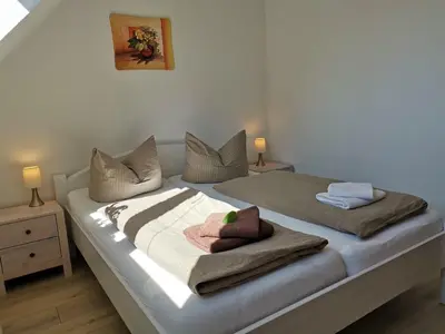 Ein Bett oder Betten in einem Zimmer der Unterkunft Ferienhaus in Papstdorf Sächsische Schweiz 17