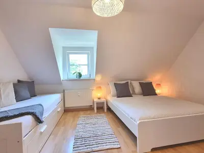 Ein Bett oder Betten in einem Zimmer der Unterkunft 2 room apt at It-district Neustadt & free parking