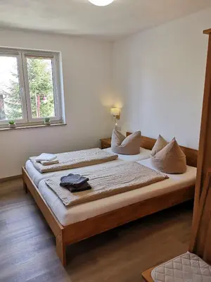 Ein Bett oder Betten in einem Zimmer der Unterkunft Apartment in Papstdorf 