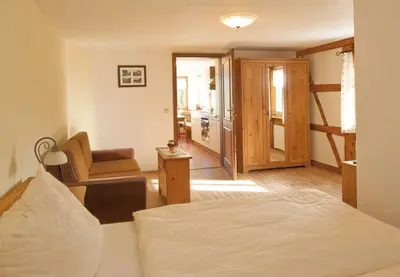 Ein Bett oder Betten in einem Zimmer der Unterkunft Ferienwohnung Kornkammer Bauernhaus Vetter