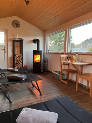 Ein Sitzbereich in der Unterkunft Ferienwohnung Kutscherstuben Bauernhaus Vetter