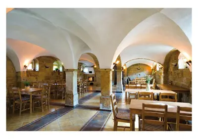 Ein Restaurant oder anderes Speiselokal in der Unterkunft Ferienwohnung Kutscherstuben Bauernhaus Vetter