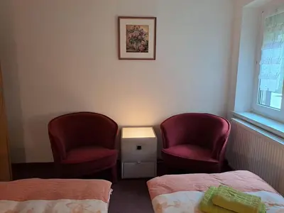 Ein Bett oder Betten in einem Zimmer der Unterkunft Ferienwohnung Hänsch