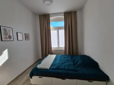 Ein Bett oder Betten in einem Zimmer der Unterkunft Chemnitz Kassberg Apartments in ruhiger Lage für Wochen oder Monatsaufenthalte
