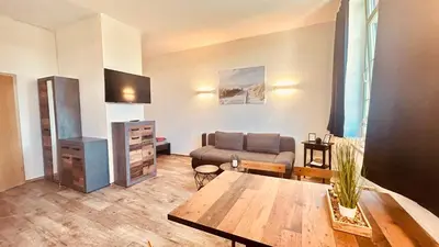 Ein Sitzbereich in der Unterkunft Richter Apartments Finsterwalde 4