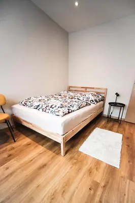 Ein Bett oder Betten in einem Zimmer der Unterkunft Ferienwohnung in Lengefeld