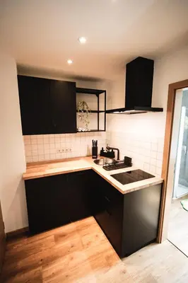 Küche/Küchenzeile in der Unterkunft Ferienwohnung in Lengefeld