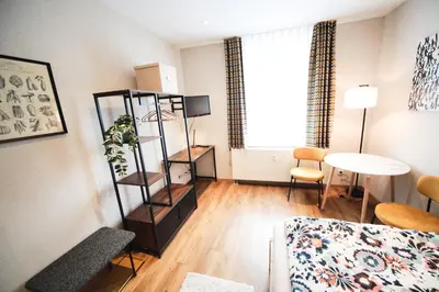Ein Bett oder Betten in einem Zimmer der Unterkunft Ferienwohnung in Lengefeld