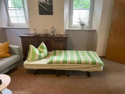 Ein Bett oder Betten in einem Zimmer der Unterkunft Ferienwohnung grünes Haus Colditz