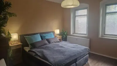Ein Bett oder Betten in einem Zimmer der Unterkunft Ferienwohnung Winternest