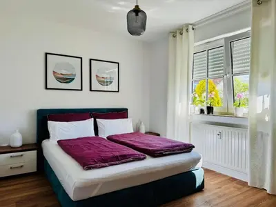 Ein Bett oder Betten in einem Zimmer der Unterkunft Ferienwohnung 