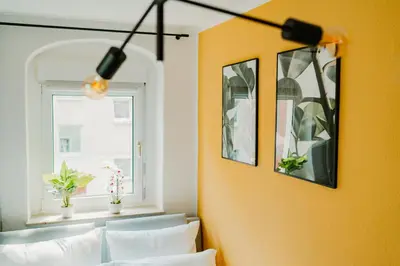 Ein Bett oder Betten in einem Zimmer der Unterkunft Modernes Apartment mit Balkon und Stellplatz