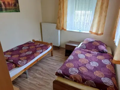 Ein Bett oder Betten in einem Zimmer der Unterkunft Ferienwohnung Bretnig
