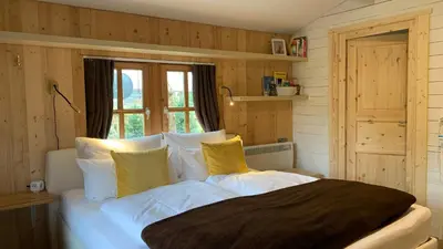 Ein Bett oder Betten in einem Zimmer der Unterkunft Strandlust Döbeln - Bungalow für eine gemütliche Auszeit zu jeder Jahreszeit