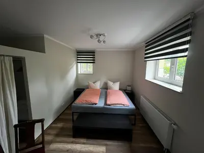 Ein Bett oder Betten in einem Zimmer der Unterkunft Apartment an der Jungen Garde