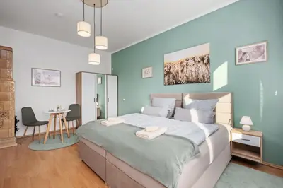 Ein Bett oder Betten in einem Zimmer der Unterkunft Neu Meißen Altstadt FamilyOase WLAN Netflix Magenta Disney