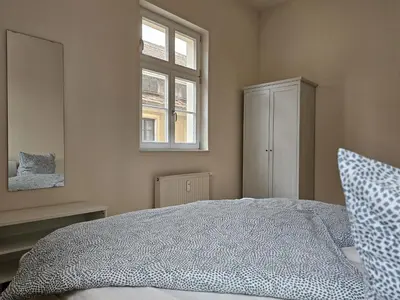 Ein Bett oder Betten in einem Zimmer der Unterkunft African Style in Kleinwelka