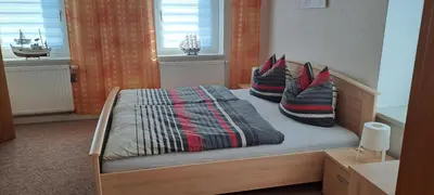 Ein Bett oder Betten in einem Zimmer der Unterkunft Am Forellenteich