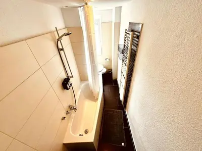 Ein Badezimmer in der Unterkunft KMHosting Zentrum Luxe Apartment Balkon